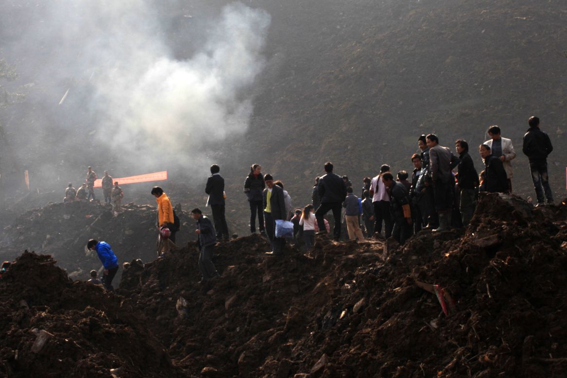 Locals gather to mourn on Saturday.