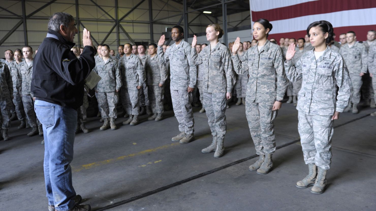 Defense Secretary Leon Panetta swears in reenlisting troops in Turkey. A survey found that military jobs tend to be the most stressful. 