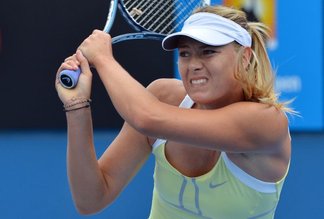 Maria Sharapova hits a return during an exhibition match in the lead-up to the Australian Open. Last year's runnerup decided to play against junior boys after having to pull out of the Brisbane tournament earlier in January.