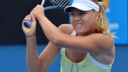 Maria Sharapova hits a return during an exhibition match in the lead-up to the Australian Open. Last year's runnerup decided to play against junior boys after having to pull out of the Brisbane tournament earlier in January.