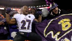 Ray Rice of the Ravens celebrates with fans in the stands after the Ravens victory on Saturday.