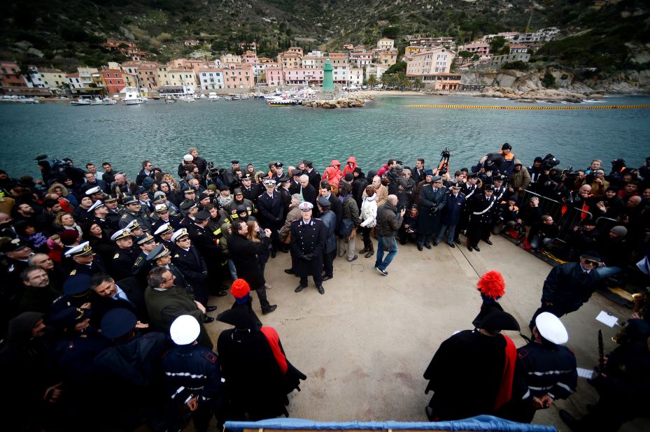 A commemorative board with the names of the victims is unveiled in Giglio on Sunday.