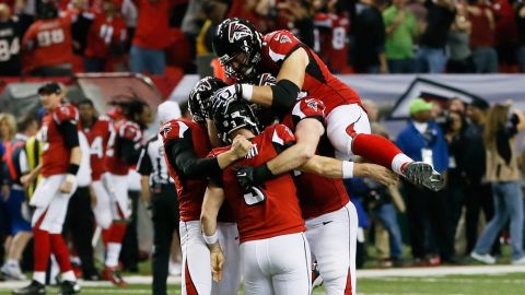 The Falcons celebrate their 30 to 28 win over the Seahawks on Sunday.