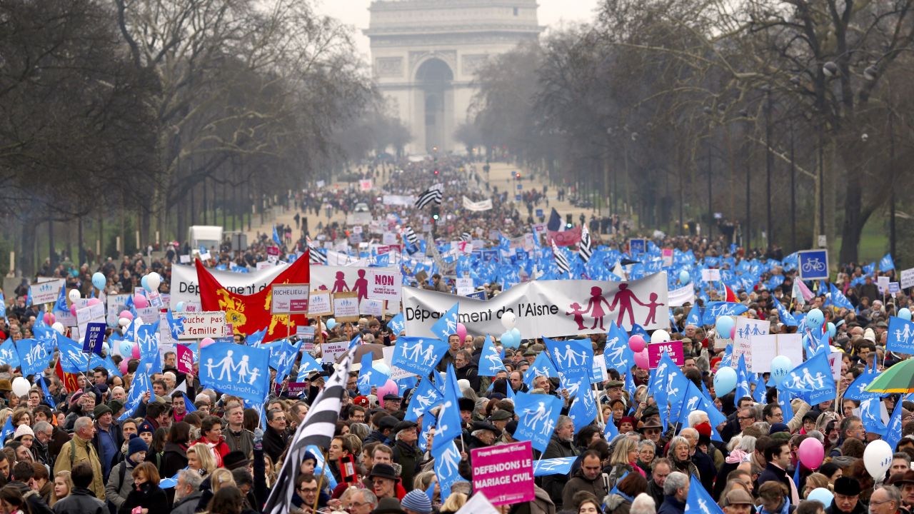 Tens of thousands march in Paris on January 13 to denounce government plans to legalize same-sex marriage and adoption.