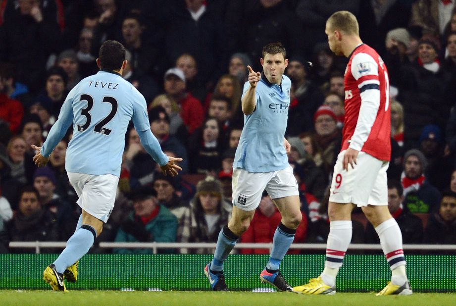 However, James Milner scored soon after and Dzeko doubled the lead before halftime -- with Carlos Tevez, left, involved in both goals.
