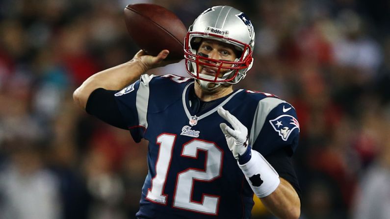 Tom Brady of the Patriots passes against the Texans on Sunday.