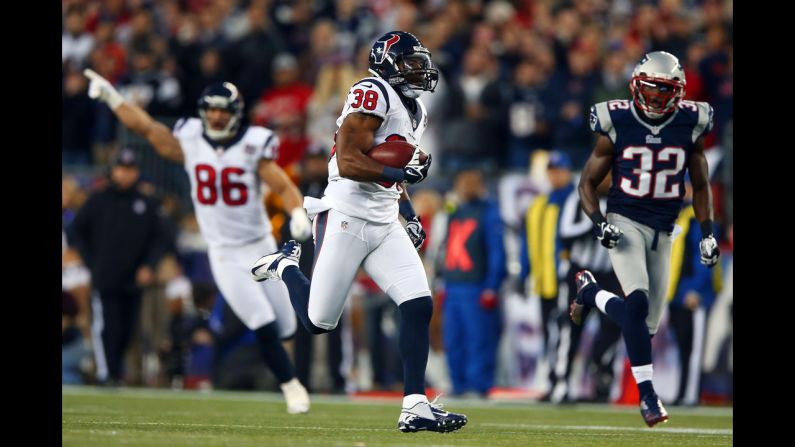 Danieal Manning of the Texans returns the opening kickoff for 94 yards against Devin McCourty of the Patriots on Sunday.