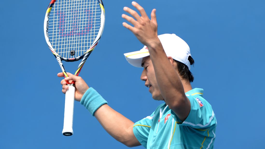 Japan's Kei Nishikori gestures after playing a stroke to Romania's Victor Hanescu during their men's singles match on January 14. Kei won 6-7(5) 6-3 6-1 6-3.