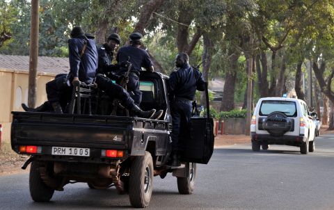 Malian police patrol Bamako on Sunday.