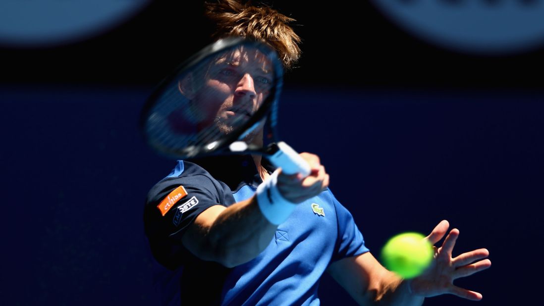 David Goffin of Belgium plays a forehand in his first-round match against Fernando Verdasco of Spain on January 14. Verdasco defeated Goffin 6-3 3-6 4-6 6-3 6-4.
