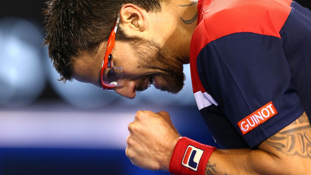 Janko Tipsarevic of Serbia celebrates winning a point in his first-round match against Lleyton Hewitt of Australia on January 14. Tipsarevic won 7-6(4) 7-5 6-3.