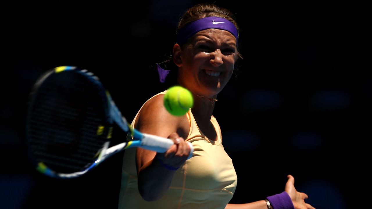 Victoria Azarenka of Belarus plays a forehand in her first-round match against Monica Niculescu of Romania on January 15. Azarenka defeated  Niculescu 6-1, 6-4.