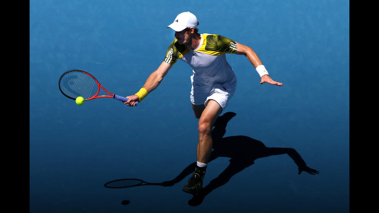 Great Britain's Andy Murray plays a forehand against Robin Haase of the Netherlands on Day 2 of the Australian Open. Murray defeated Haase 6-3, 6-1, 6-3. Murray won 6-3 6-1 6-3.