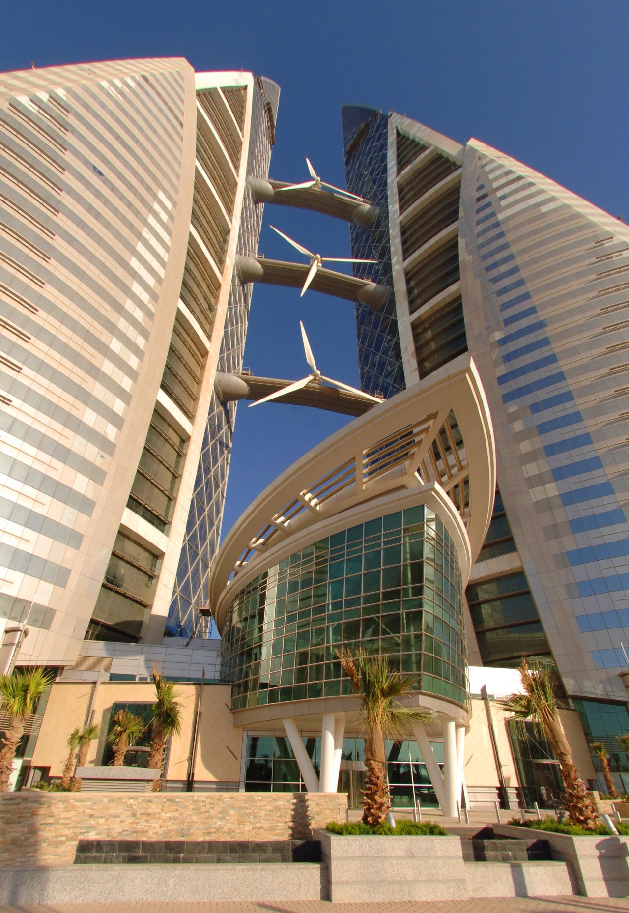 <a href="http://www.bahrainwtc.com/" target="_blank" target="_blank">The Bahrain World Trade Center</a>, built in 2008, is 50 floors high, and,  uniquely, giant wind tubines connect the building's two towers. The turbines generate for 11-15% of the power required by the building when fully operational, according to architect <a href="http://www.atkinsglobal.com/" target="_blank" target="_blank">Atkins</a>.