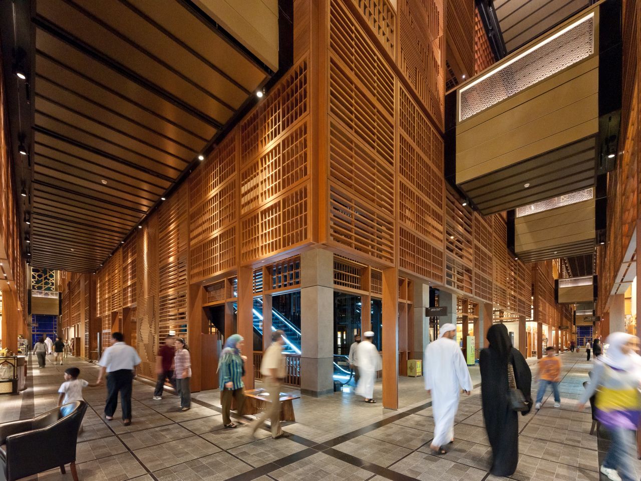 This photo shows shoppers browsing Abu Dhabi's rebuilt central market -- ventilation in the market is controlled by sliding roofs and walls.