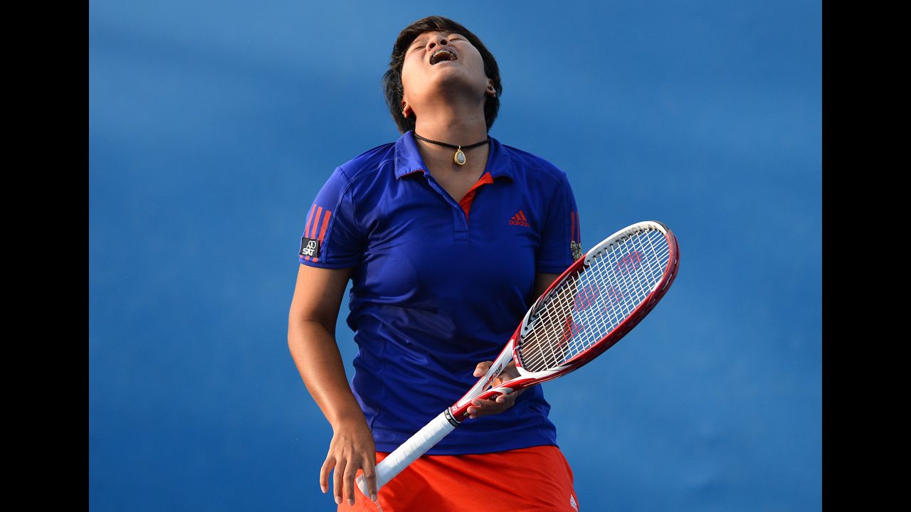 Thailand's Luksika Kumkhum reacts after a point against Hungary's Timea Babos during their women's singles first-round match on January 15. Kumkhum defeated Babos 7-6(5), 6-4.