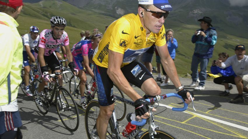 Lance Armstrong of the USA and US Postal Service Team rides hard up the Col de la Madeleine during stage 16 of the 2002 Tour De France on July 24th, 2002 from Les Deux-Alps to La Plagne .