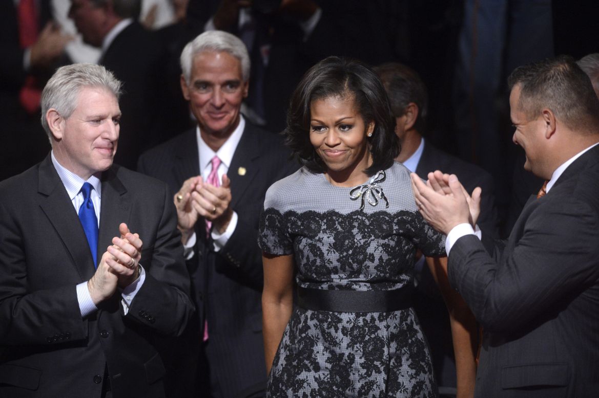 At the final 2012 presidential debate in Boca Raton, Florida, Obama donned the same Thom Browne fog-gray dress with black lace overlay that she had worn at the Democratic National Convention, reworked this time with a black belt and a stone brooch, Taylor noted.