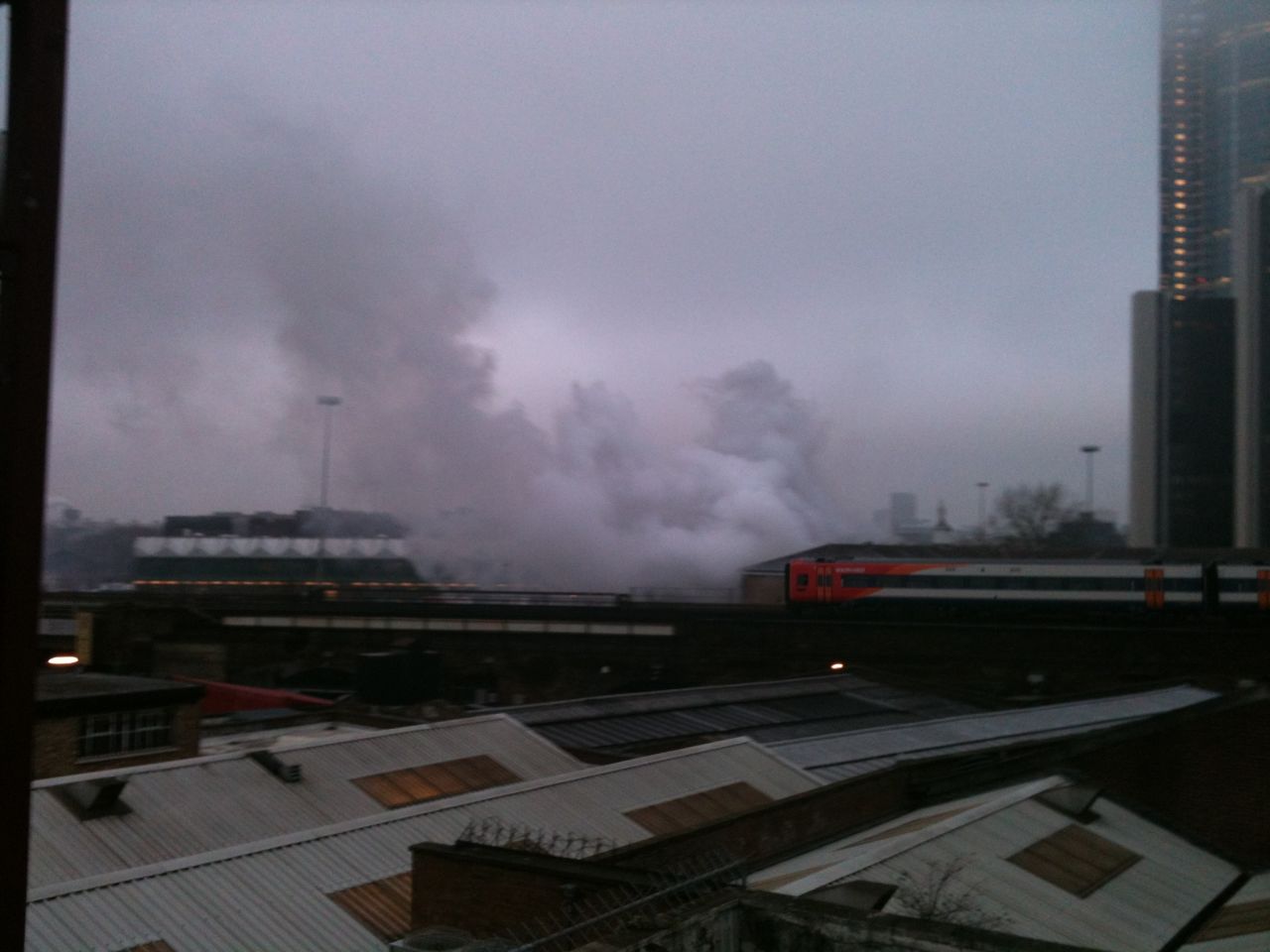 Smoke billows over central London's Vauxhall Cross area after a helicopter crash on the morning of January 16.