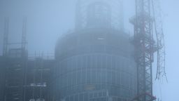 Fog surrounds a damaged crane attached to St Georges Wharf Tower after a helicopter reportedly collided with it, in Vauxhall, on January 16, 2013 in London, England.