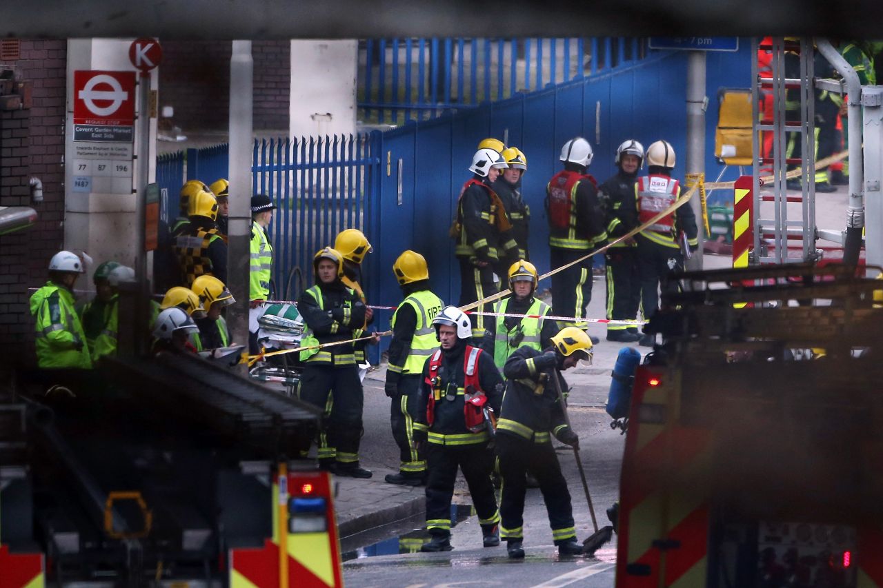 Emergency services at the scene after a helicopter reportedly collided with a crane attached to St Georges Wharf Tower in Vauxhall, on January 16 in London, England.