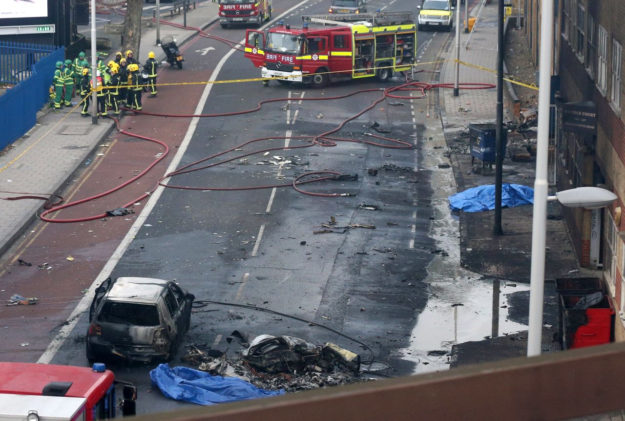 Emergency services at the scene after a helicopter reportedly collided with a crane attached to St Georges Wharf Tower in Vauxhall.