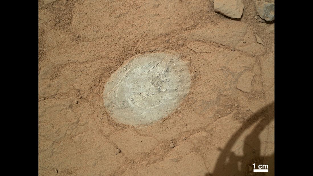 Curiosity used a dust-removal tool for the first time to clean this patch of rock on the Martian surface on January 6, 2013.