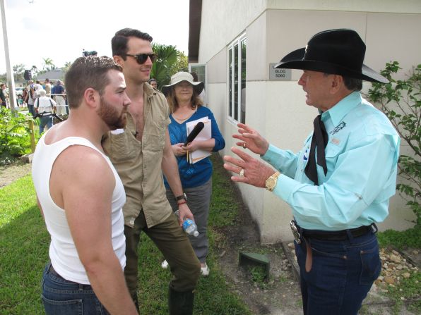 Blake Freeman, left, and Graham Rogers drove all the way from Kentucky to compete during the first weekend of the monthlong event. Both law school students, the pair admit they have no experience and are "bad afraid of snakes." They consulted Alligator Ron for advice before heading out into the Everglades tailed by a French film crew.