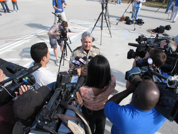Reporters from as far away as France, England and China flocked to the kickoff of the 2013 Python Challenge at the University of Florida Fort Lauderdale campus in Davie, Florida. Members of the media seemed to outnumber hunters 2 to 1. Here, FWC officer Jorge Pinto is asked about the challenge.