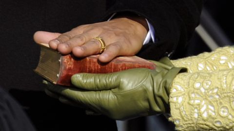 Barack Obama's hand lies on a Bible held by Michelle Obama as he is sworn in as the 44th U.S. president on January 20, 2009. 