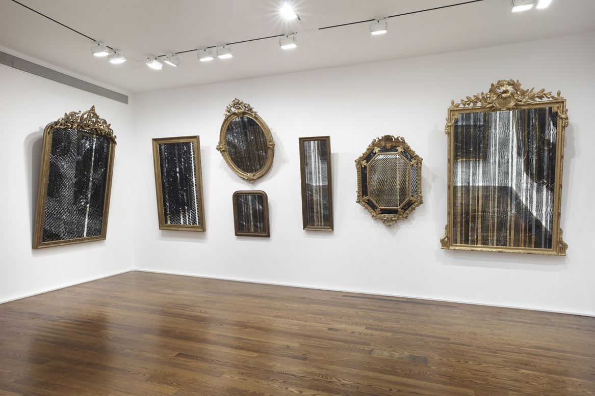 "Reveal the Secrets That You Seek" (2011) is an installation of 27 shattered mirrors covered in a pattern of bindis. She invites the viewer to become enveloped in their reflection and in turn become part of the work itself.