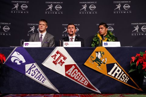 Heisman finalists quarterback Collin Klein, left, of the Kansas State Wildcats, quarterback Johnny Manziel, center, of the Texas A&M University Aggies and linebacker Te'o speak during a news conference before the 78th Heisman Trophy Presentation at the Marriott Marquis on December 8, 2012, in New York City.