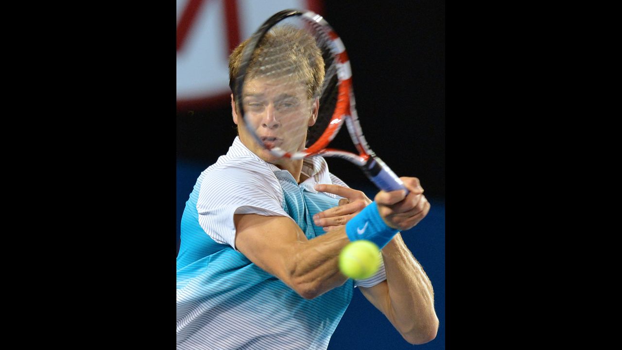Harrison plays a return during his men's singles match against Djokovic on January 16. 