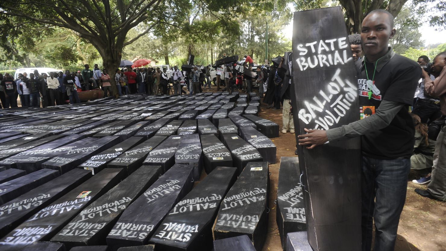 Kenyans used symbolic coffins to "bury" parliament members as a show of outrage over a proposal that awards lawmakers hefty retirement packages. 