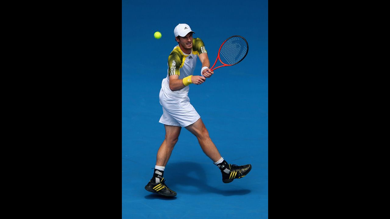 Andy Murray of Britain plays a backhand in his second-round match against Joao Sousa of Portugal on January 17. Murray defeated Sousa 6-2, 6-2, 6-4.