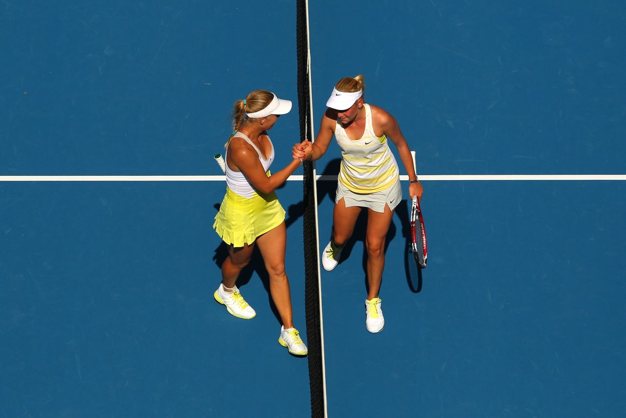 Caroline Wozniacki of Denmark, left, shakes hands with Croatian Donna Vekic on January 17 after defeating her 6-1, 6-4.