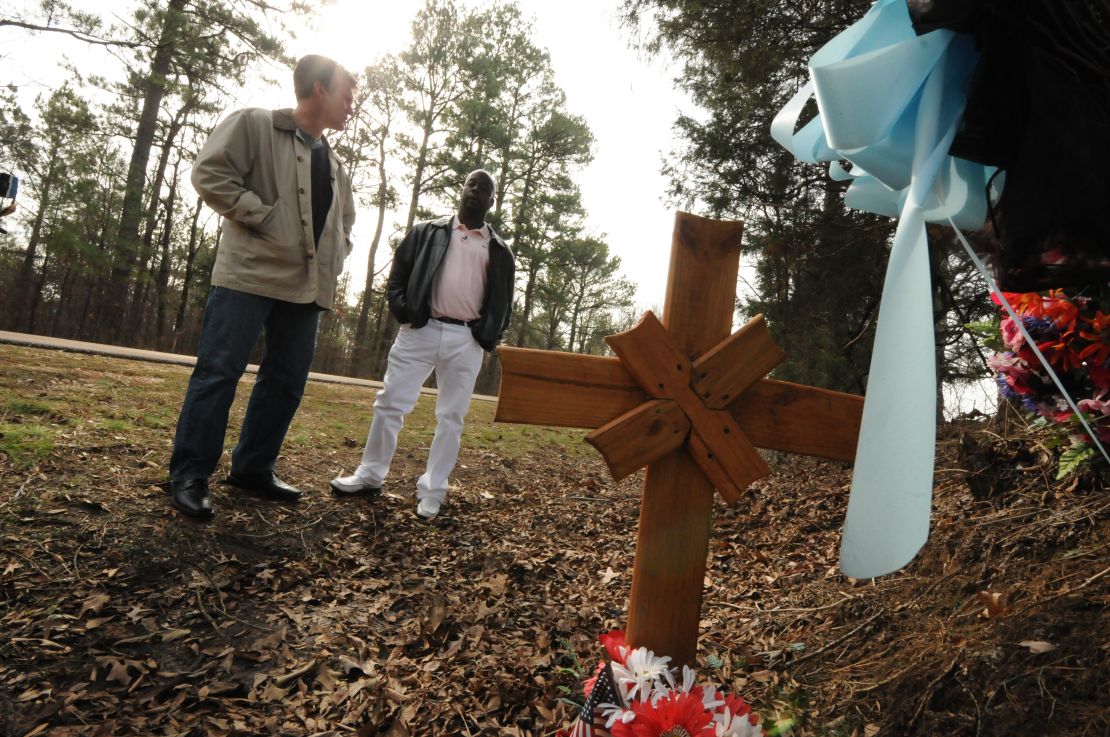 Donny Butts stands on a Mississippi roadside where his father was hit and killed by a white teen driver.