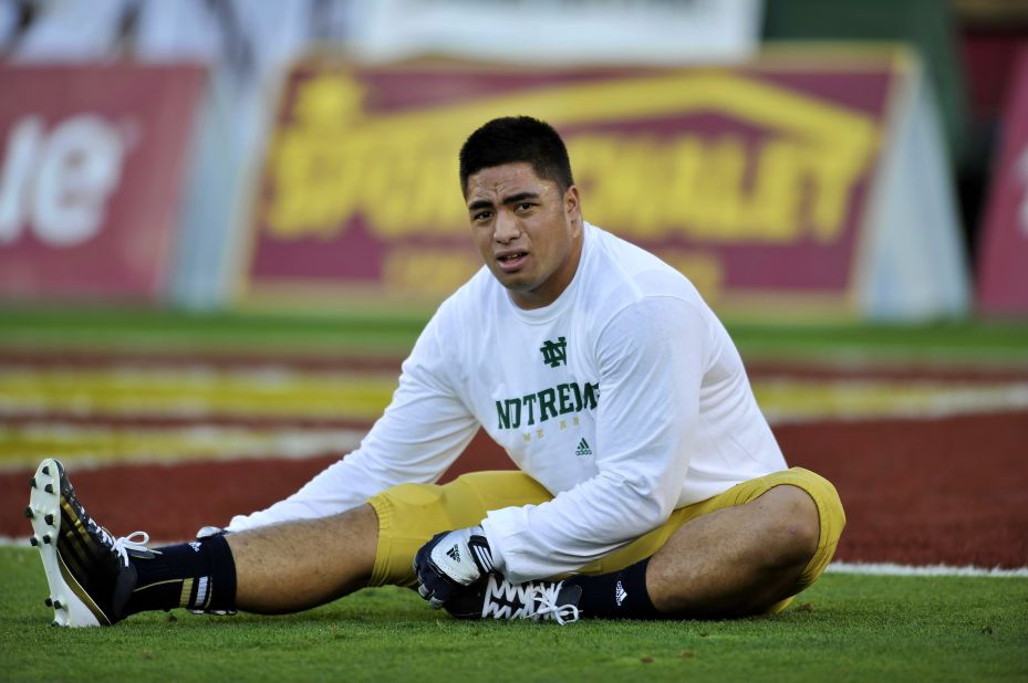 Te'o stretches on November 24, when the Fighting Irish defeated the USC Trojans 22-13 in Los Angeles.
