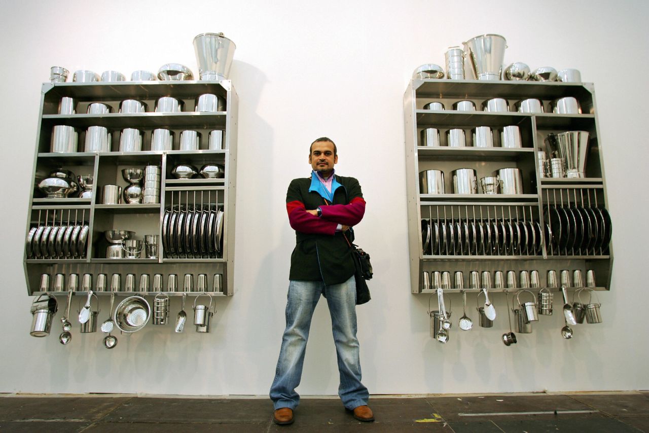 Shortly after arriving in India she fell in love with her husband, Subodh Gupta. Gupta is also a well-known artist -- here he stands by his artwork at Frieze Art Fair in 2005.