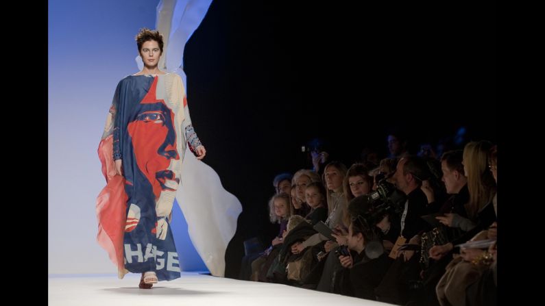ITALY: A model displays a dress with a portrait of Obama as part of Italian fashion house Gattinoni Haute Couture's spring-summer collection 2009 during the AltaRomAltaModa on February 1, 2009, in Rome.