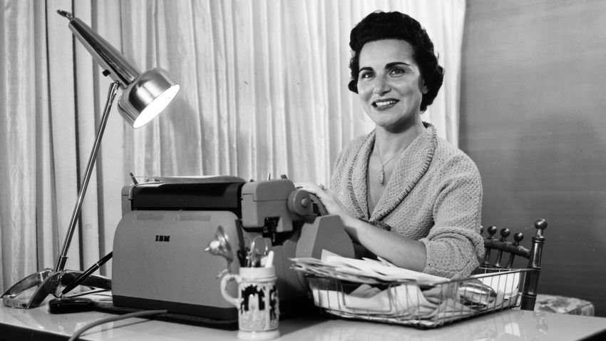 circa 1958: Author and 'Dear Abby' columnist Abigail Van Buren, seated at her desk, her hands on the IBM typewriter. She has counseled several generations of letter-writers seeking advice in a syndicated newspaper column. (Photo by Hulton Archive/Getty Images) 