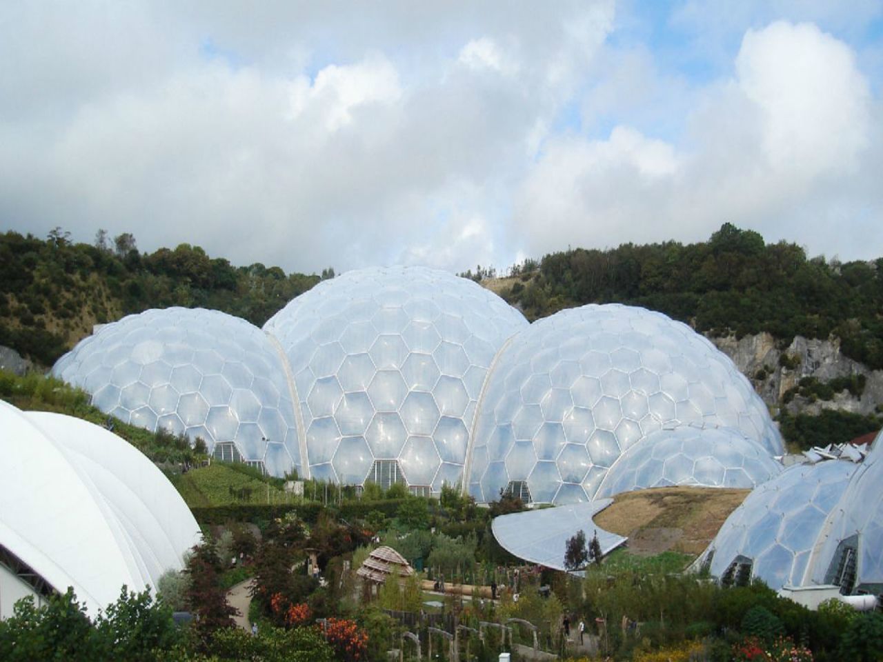 Taking nearly six years between concept and opening, the ambitious <a href="http://www.edenproject.com" target="_blank" target="_blank">Eden Project</a> opened to the public in March 2001. The attraction features two immense plastic and steel enclosures that emulate natural biomes and house thousands of plant species. <br /><br />In the last decade, the complex has hosted concerts, marathons and weddings. The addition of a sustainable education center, a giant "robot" made from scrap electronics and, more recently, a "rainforest lookout" aerial tower, have all contributed to Eden's popularity.  <br />(Image: Courtesy Lawrie Cate)
