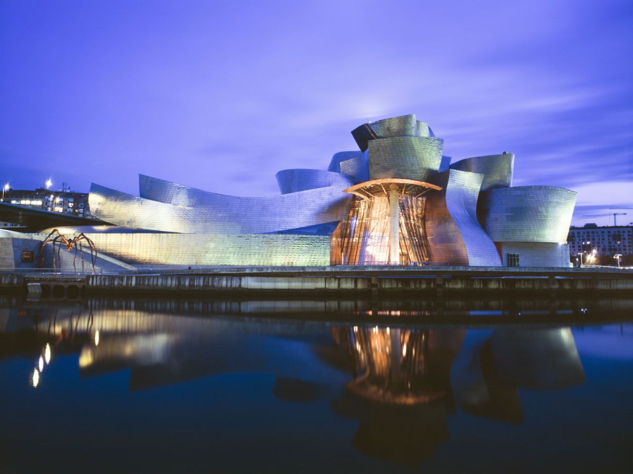Inaugurated with great fanfare in 1997 -- King Juan Carlos I personally christened the building -- <a href="http://www.guggenheim-bilbao.es/" target="_blank" target="_blank">Bilbao's Guggenheim Museum</a> continues to charm visitors from around the world. Given carte blanche to design something "innovative" by the museum's director, legendary architect Frank Gehry created a seamless-looking structure made of limestone, glass and titanium that dramatically captures the light when viewed from the adjacent Nervión River. <br /><br />The museum was featured in the James Bond film "The World is Not Enough," Mariah Carey's music video "Sweetheart" and in the computer game SimCity 4.