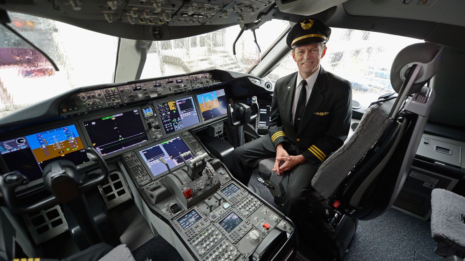 (File) United Airlines First officer Mike McCann sits in the cockpit of Boeing 787 Dreamliner on November 30, 2012 in Los Angeles.