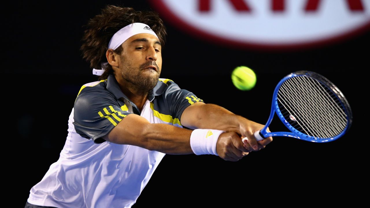 Baghdatis plays a backhand during his third-round match against Ferrer on January 18.