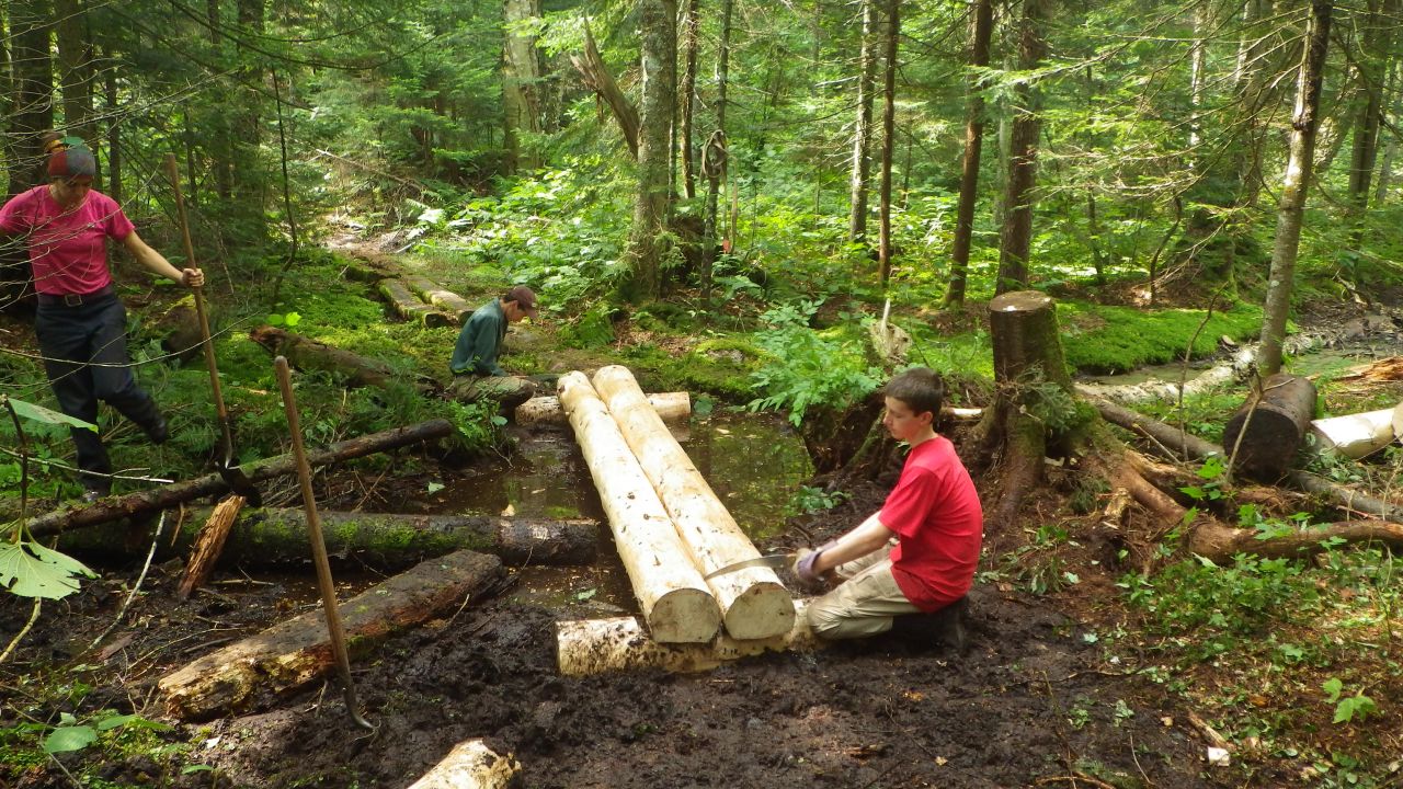Adirondack Mountain Club teen trail volunteers build footbridges in the West Canada Lakes Wilderness Area in New York.