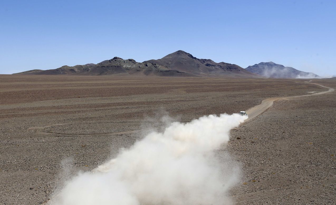 Stephane Peterhansel and co-driver Jean Paul Cottret, both from France, drive their Mini during Stage 13 of the 2013 Dakar Rally between Copiapo and La Serena, in Chile, on Friday, January 18. 
