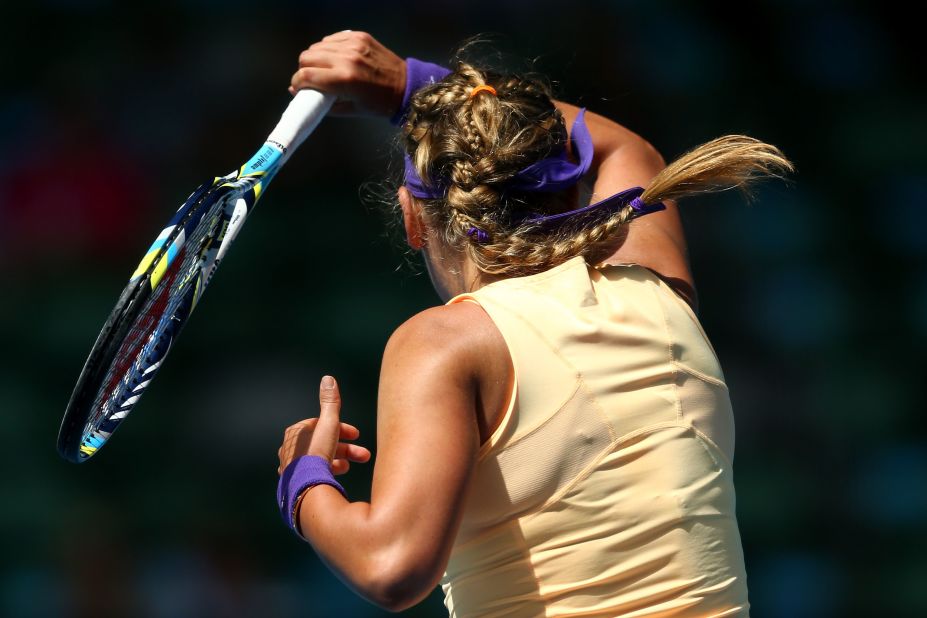 Victoria Azarenka of Belarus plays a forehand in her third-round match against Jamie Hampton of the United States.