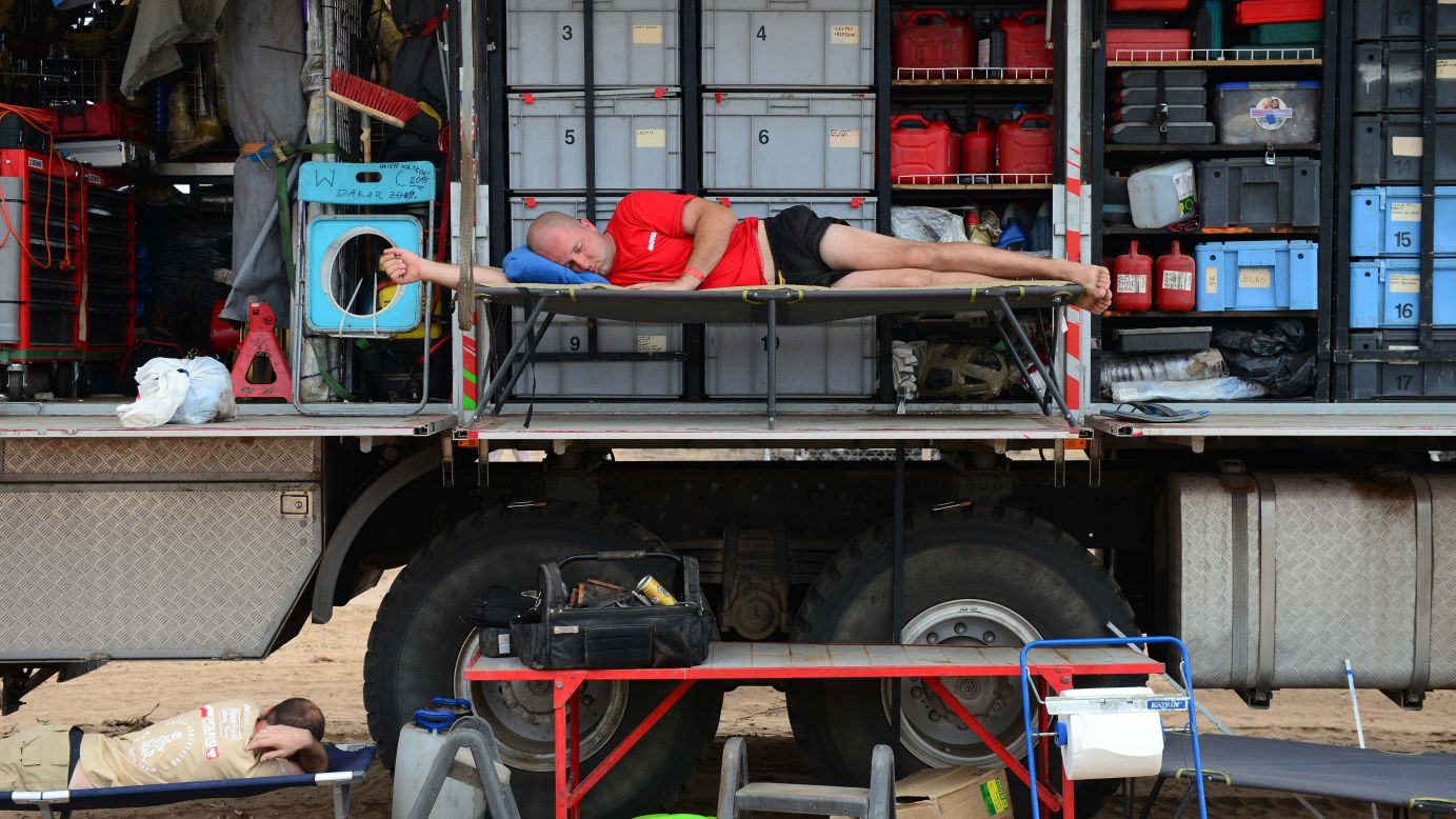 A mechanic rests on a truck on January 18.