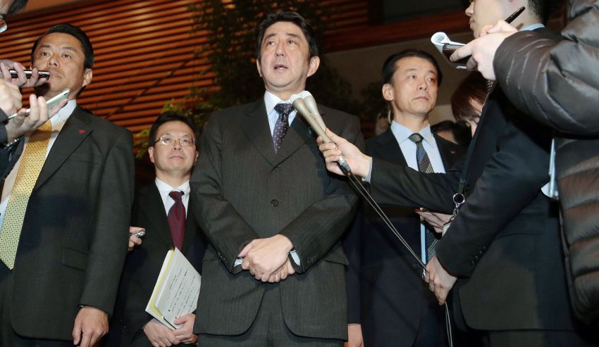 Japanese Prime Minister Shinzo Abe speaks to reporters in Tokyo after a telephone conversation with Algerian counterpart Abdelmalek Sellal Sunday.